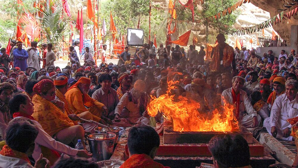 prayers in front of fire